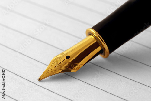 Elegant fountain pen on paper with clipping path