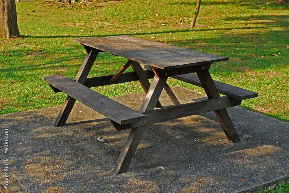wooden table and chair in the parks wooden table and chair in the parks