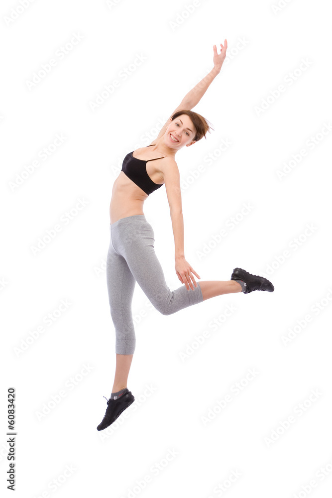 beautiful young woman jumping on white background