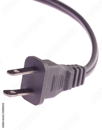 black electric plug macro isolated on white background