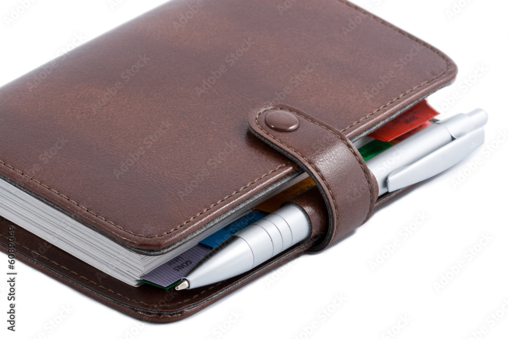 pocket planner and pen isolated pocket planner and pen isolated