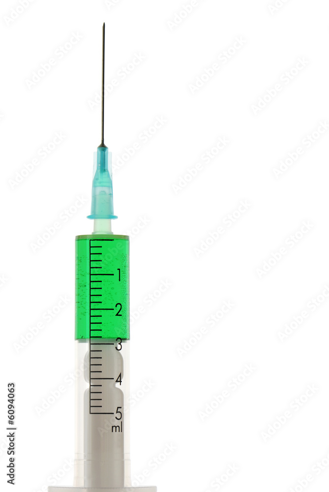 Close up on vertical syringe Close up on vertical syringe