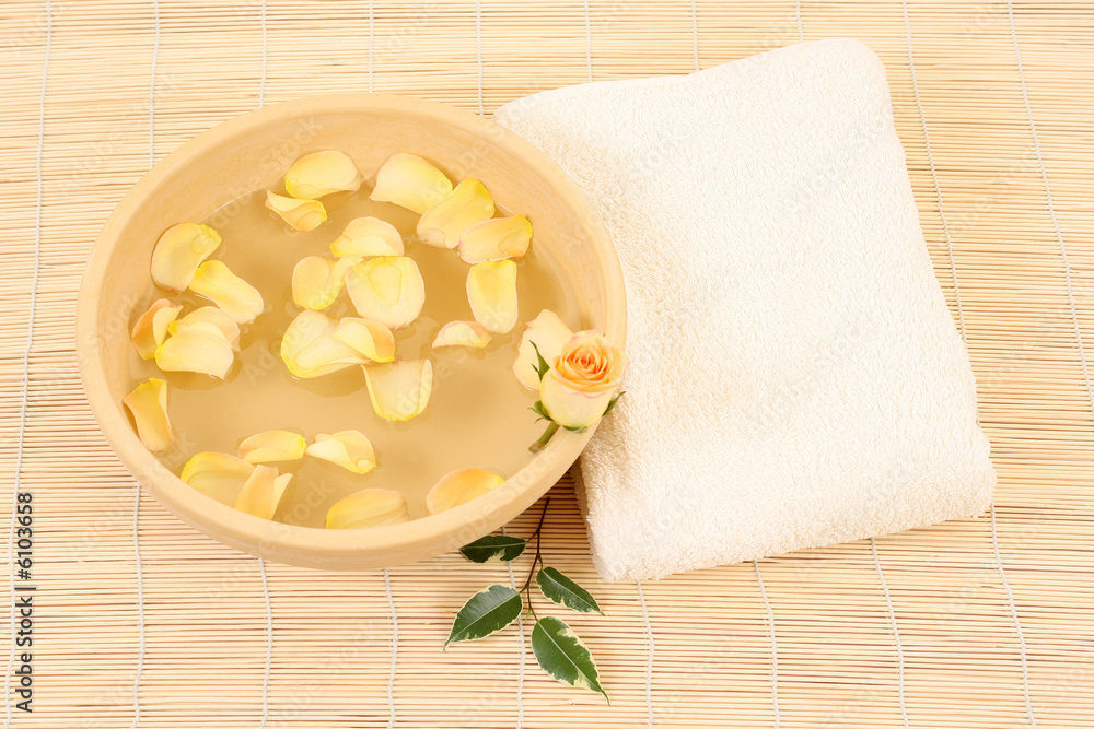 bowl of pure water rose and towel bowl of pure water rose and towel