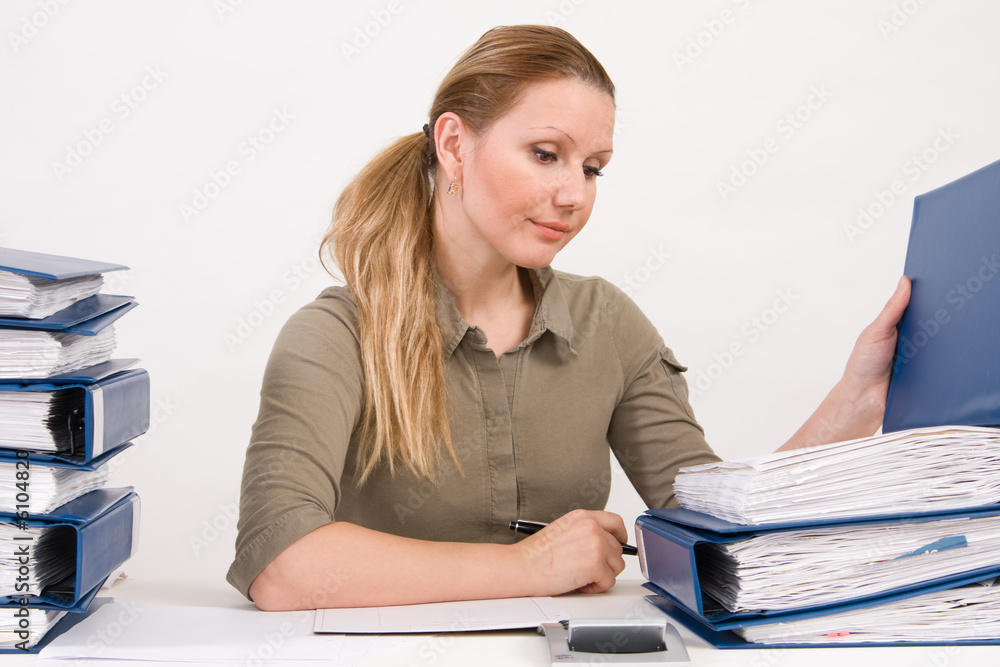 Confident business woman working with documents Confident business woman working with documents