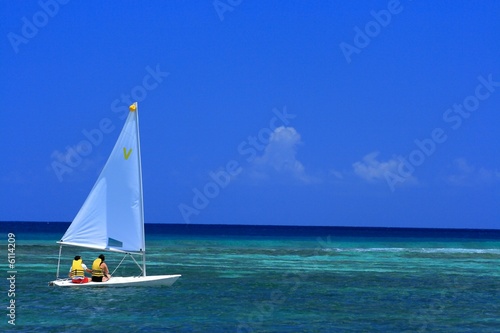 sailing past on a tropical island