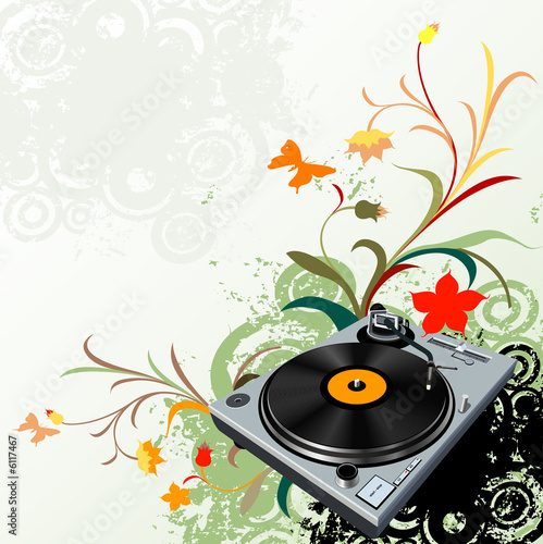 turntable on floral grunge ...
