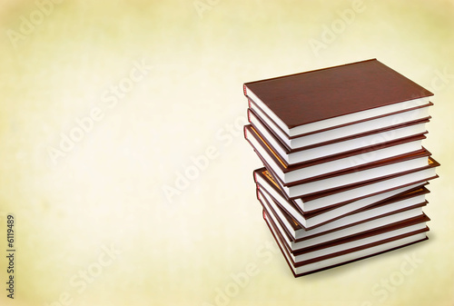 stack of books against retro background photo