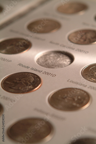 U S state quarters coin collection in book