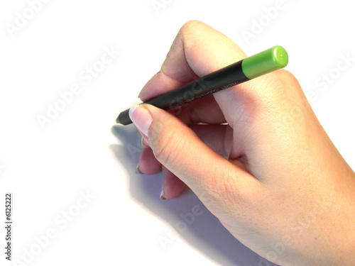 green pencil in hand