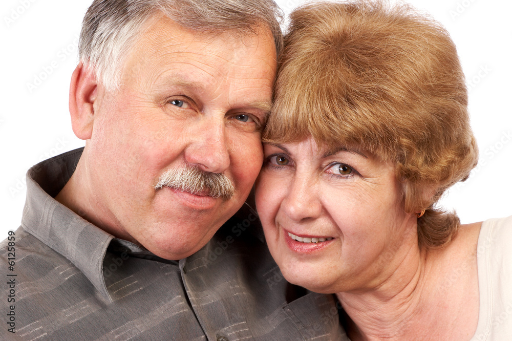 happy elderly couple in love. over white background. happy elderly couple in love. over white background.