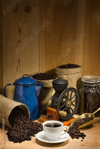 Coffee cup and saucer against a rustic background