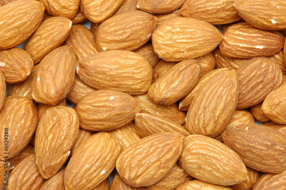 Close up of roasted almond snack background Close up of roasted almond snack background