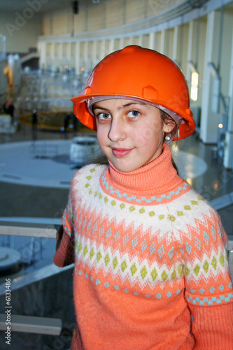 The girl in an orange helmet