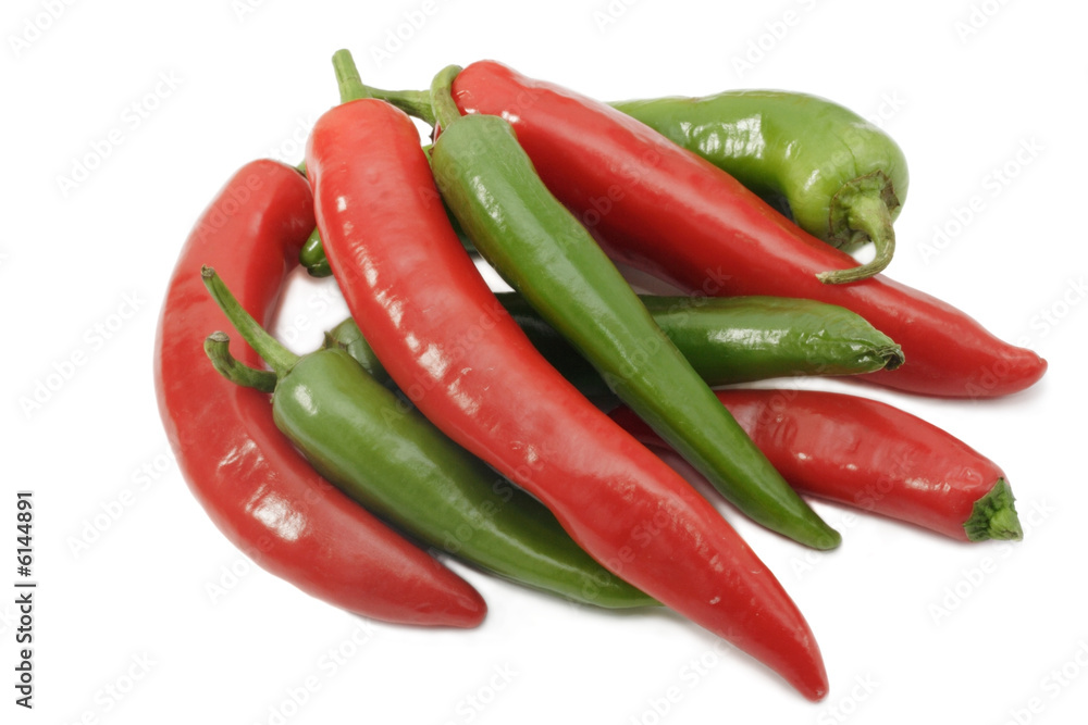 Group of red and green pepper on white