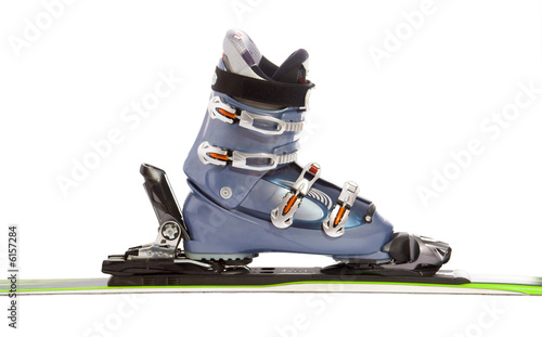 Modern ski and boot isolated on white background
