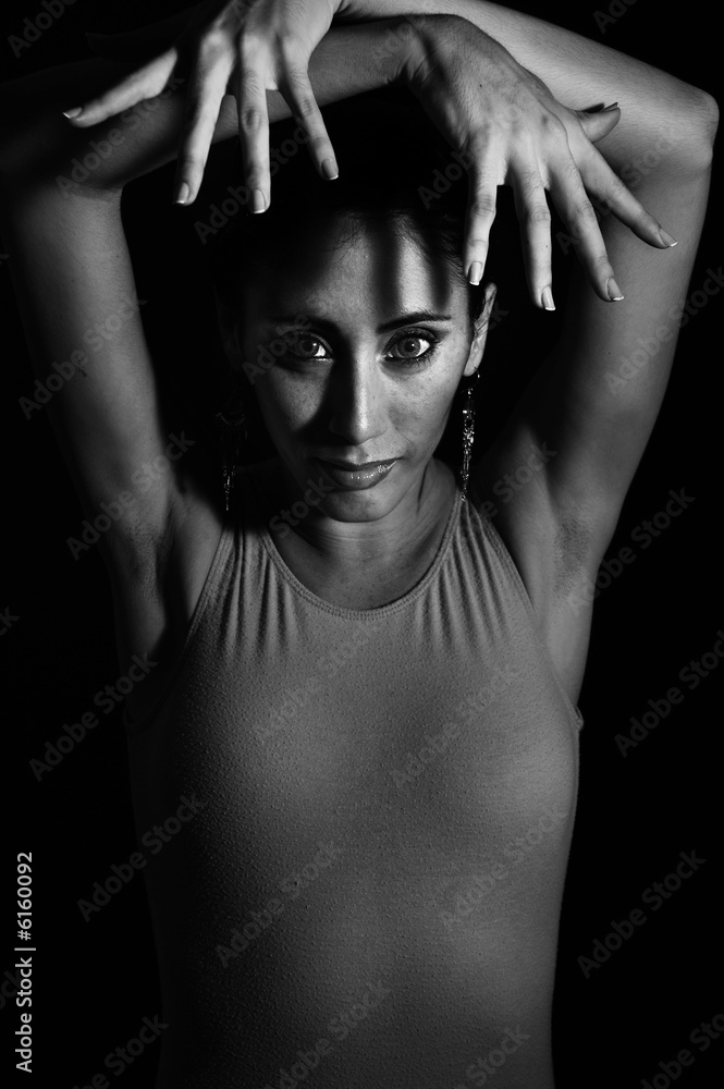 Obraz premium Passionate flamenco dancer girl isolated on black