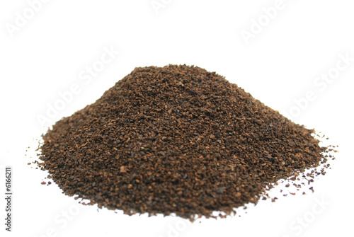 Ground coffee isolated on white background