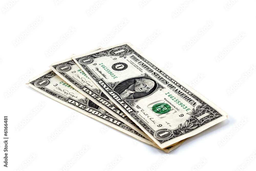 Three denominations one dollar laid by fan on white background Three denominations one dollar laid by fan on white background