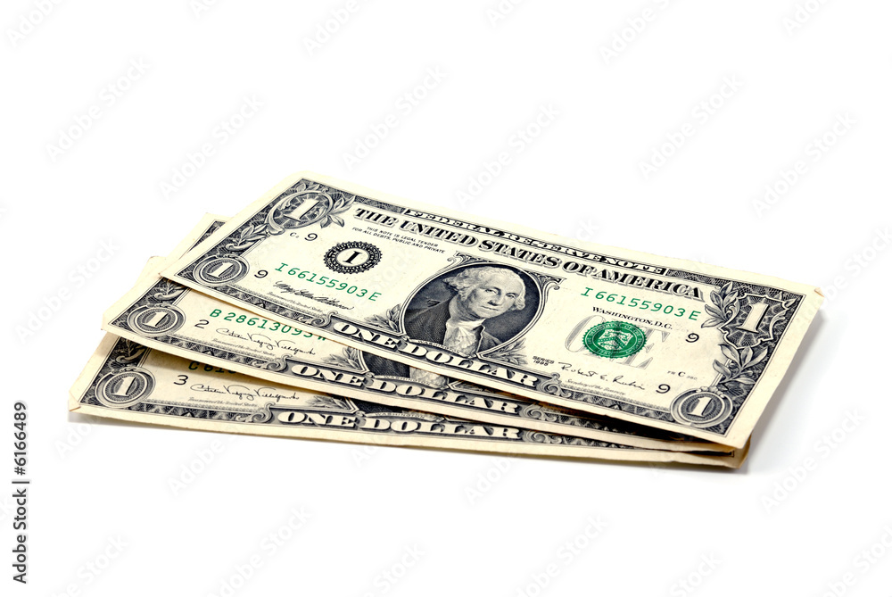 Three denominations one dollar laid by fan on white background Three denominations one dollar laid by fan on white background
