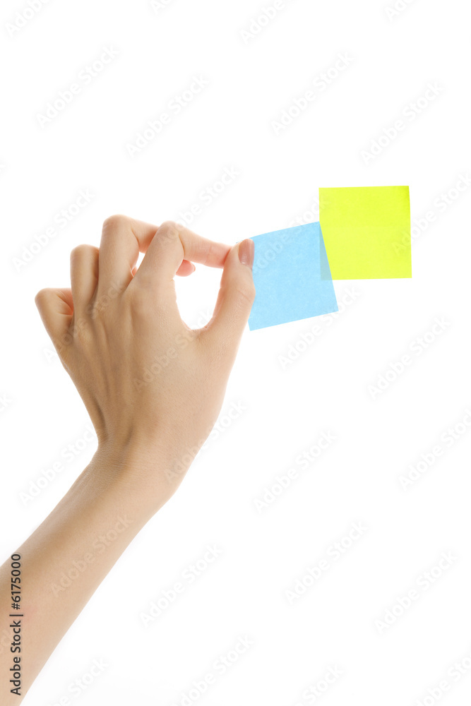 Putting sticky notes on the wall (isolated) Putting sticky notes on the wall (isolated)