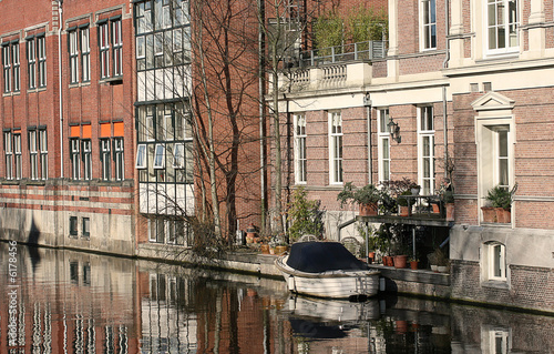 Amsterdam: historical houses, boat and canal