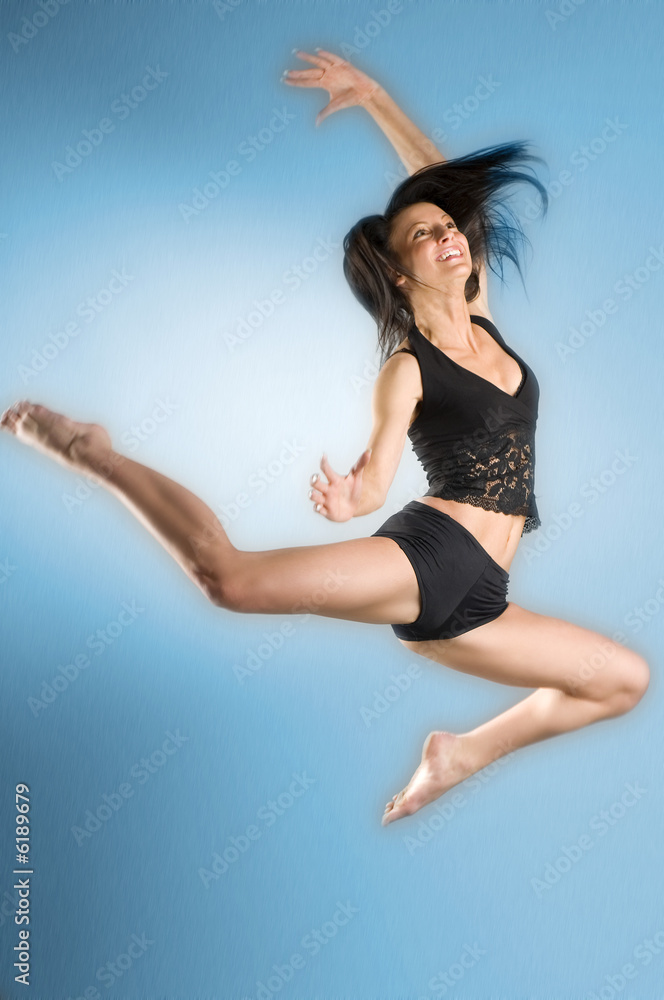 a modern nice dancer with black dress in blue background a modern nice dancer with black dress in blue background