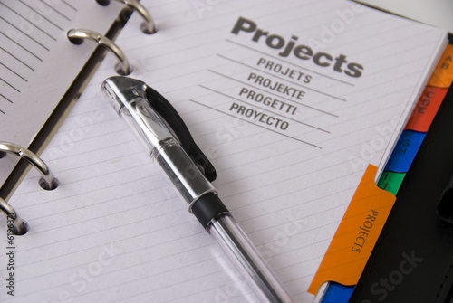 note book with pencil close up shoot