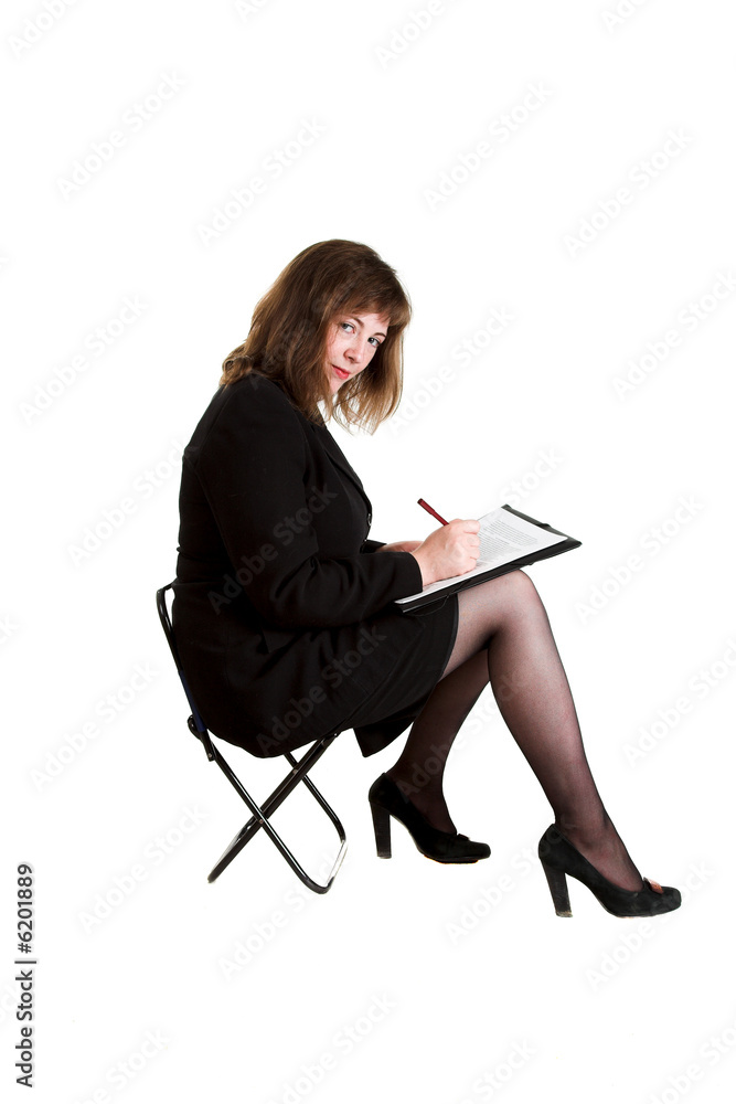 young businesswoman in black dress isolated on white young businesswoman in black dress isolated on white