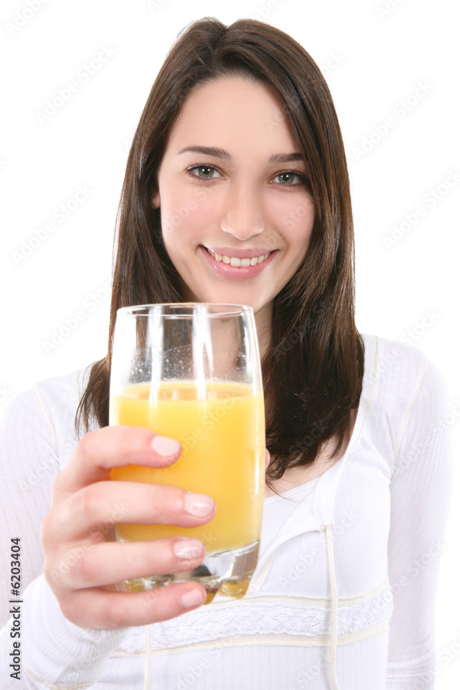 A pretty young woman drinking orange juice A pretty young woman drinking orange juice