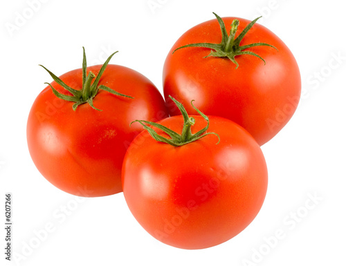 three full tomatoes isolated on white background