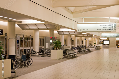 Airport termical interior with gates and waiting area