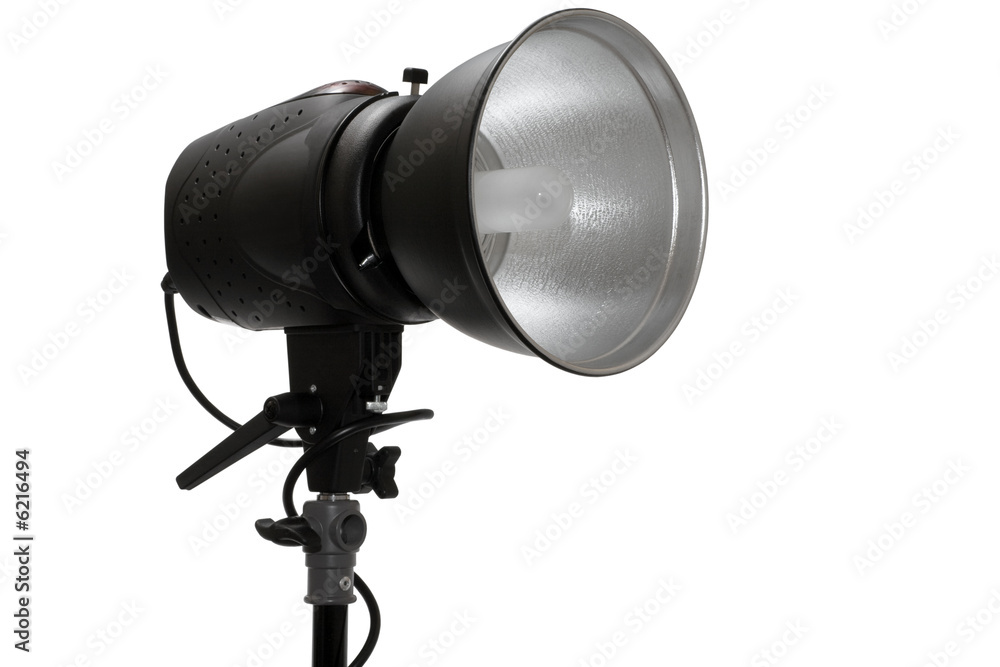 Modern powerful photographic flash on a white background Modern powerful photographic flash on a white background
