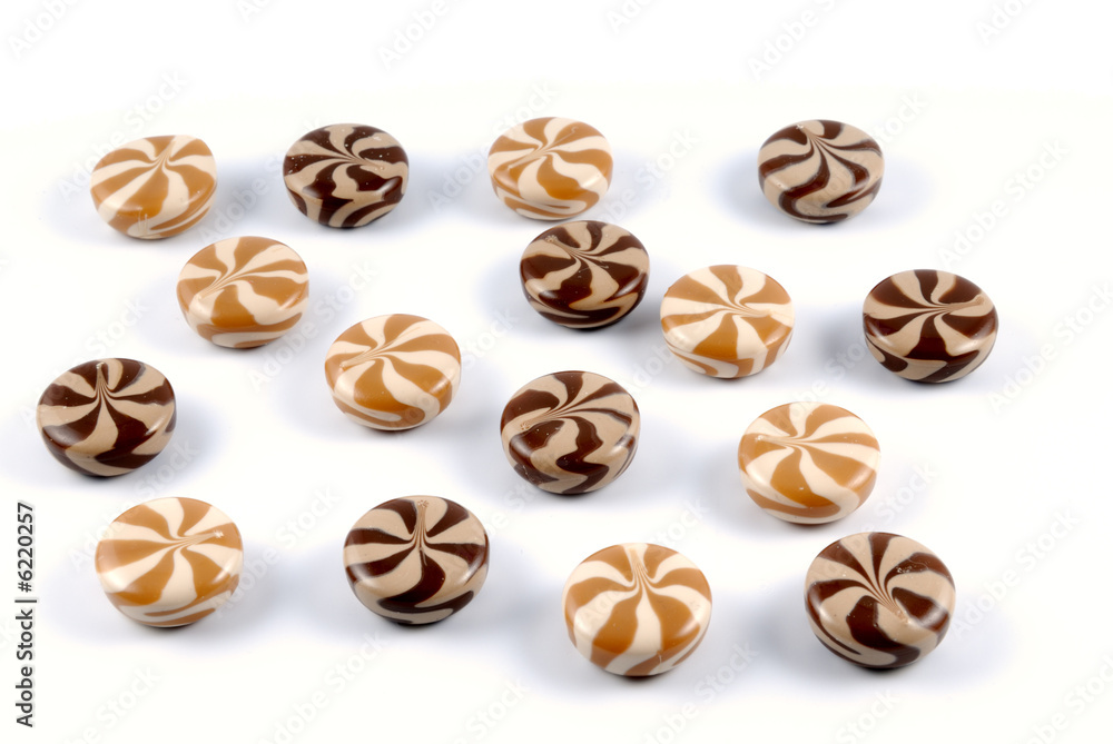 Chocolate-creamy of a sweet sugar on a white background Chocolate-creamy of a sweet sugar on a white background