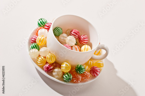 food serias: cup with striped sugar candy