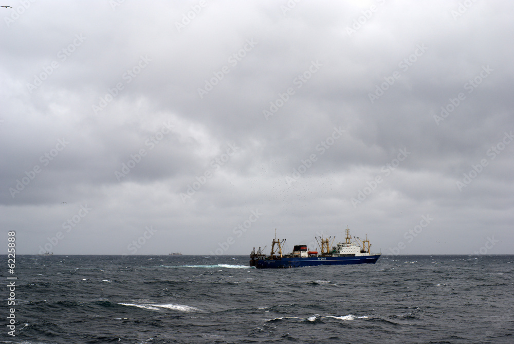 stormy whether and factory vessel, open sea