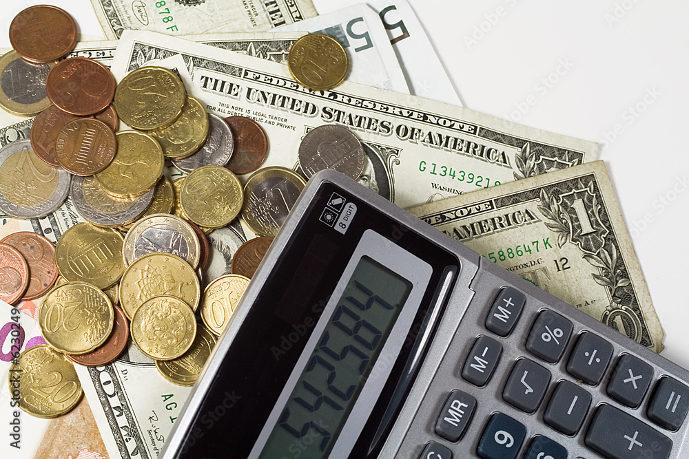 a lot of american money and coins and calculator a lot of american money and coins and calculator