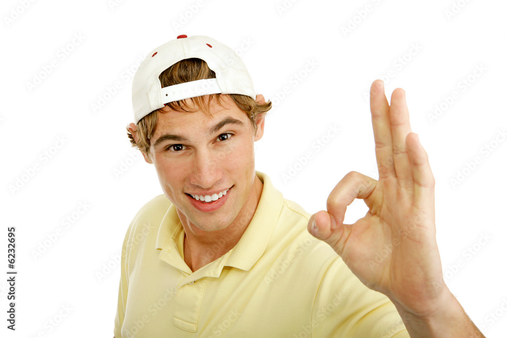 Handsome college age young man giving Aokay sign Handsome college age young man giving Aokay sign