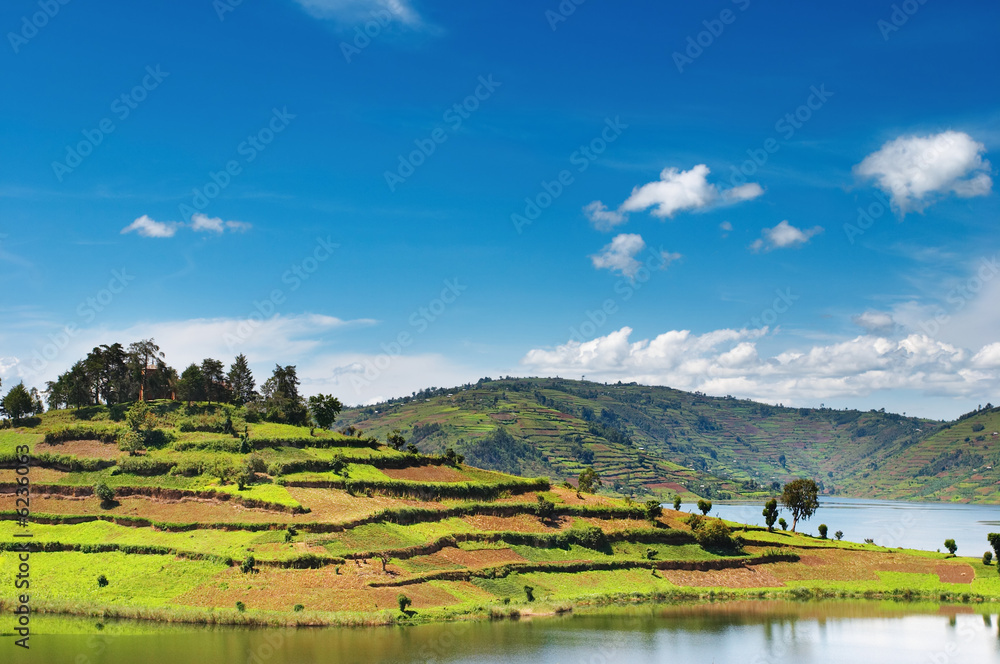 African landscape with lake and blue sky