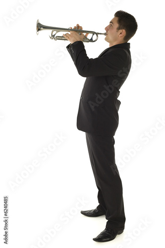 Man in suit standing and trumpet melody. 