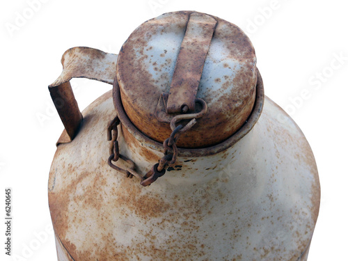 Rusty milk bucket on white background