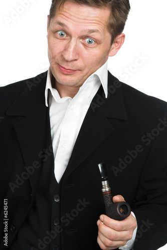 The person in a black suit on a white background