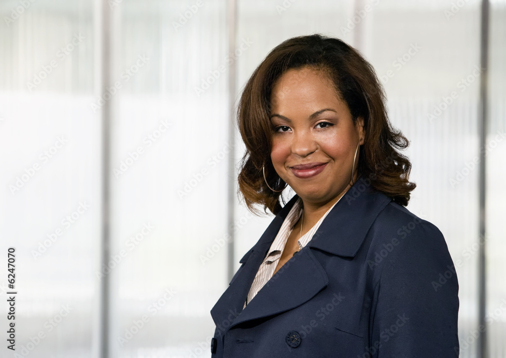 Close-up of an African-American Businesswoman in an Office Close-up of an African-American Businesswoman in an Office