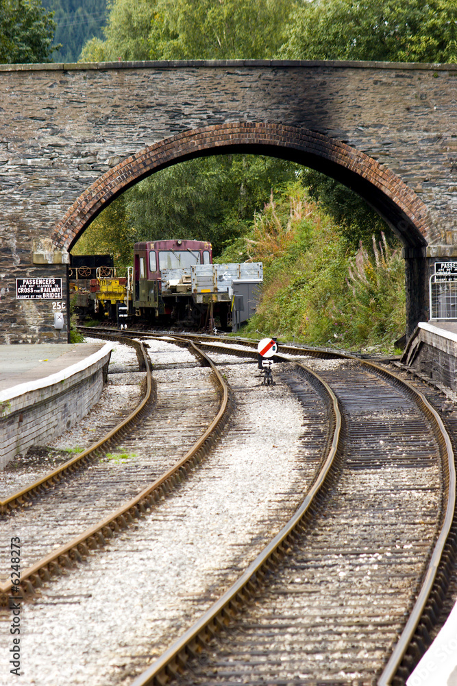 Obraz premium A bridge over the tracks of a preserved Vctorian railway