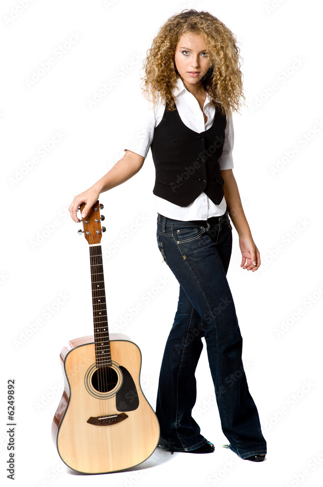 A pretty teenage girl with acoustic guiatr