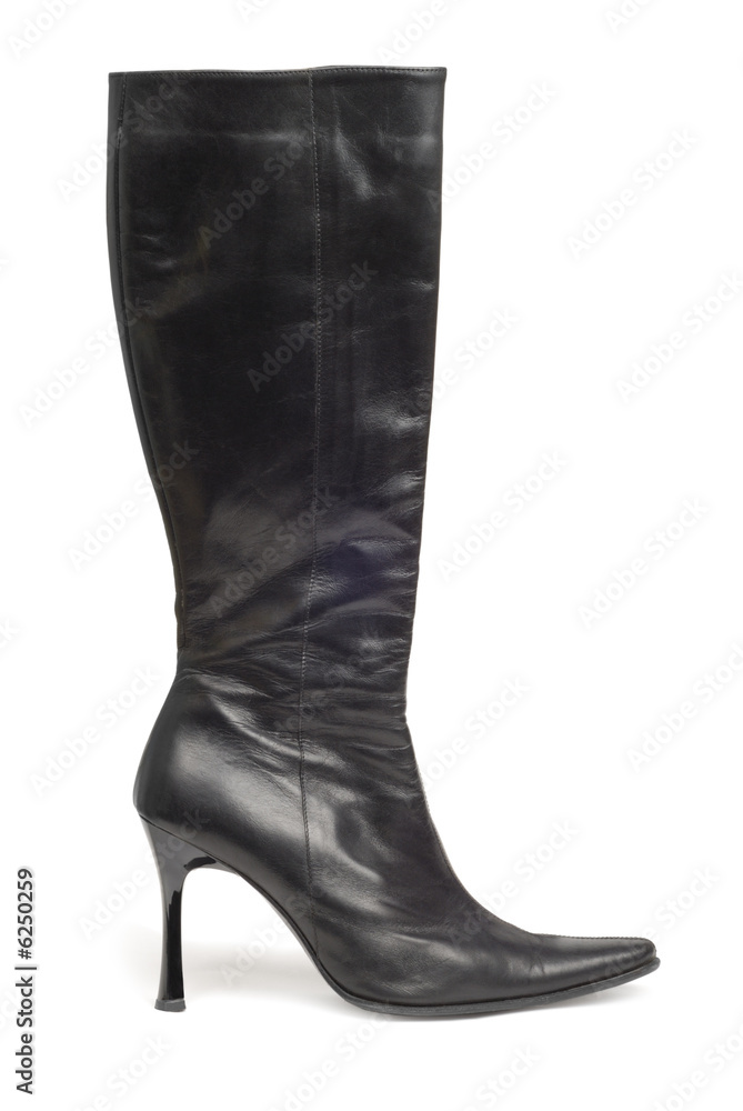Black shine woman boot isolated over white Black shine woman boot isolated over white