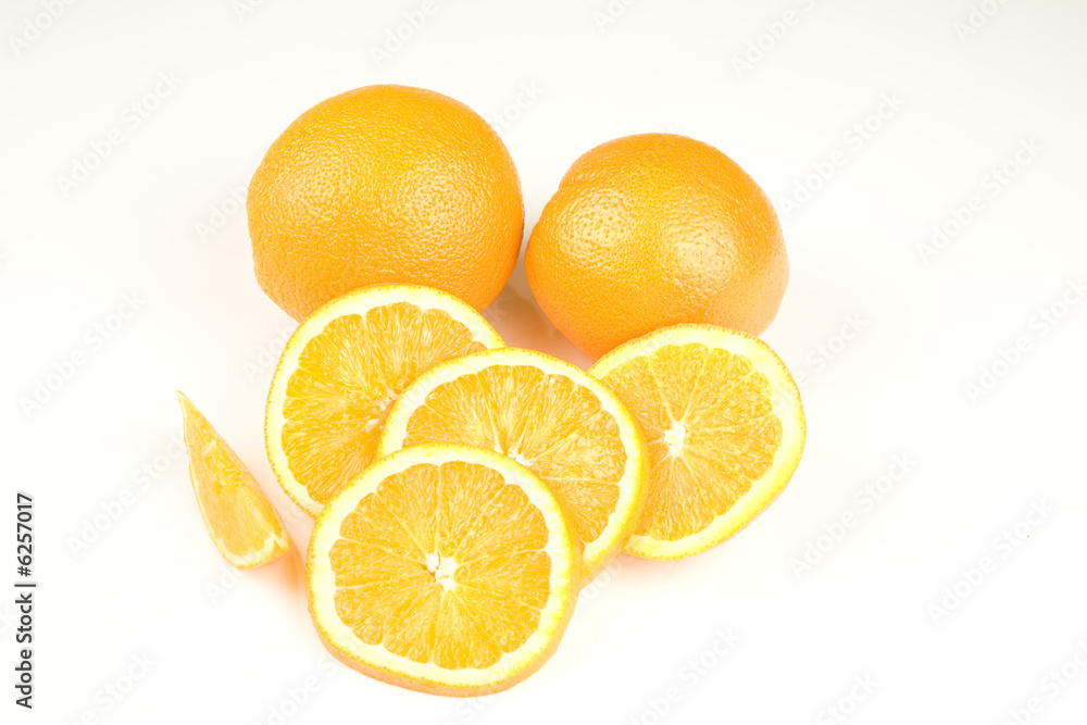 Oranges and slices isolated on white background Oranges and slices isolated on white background