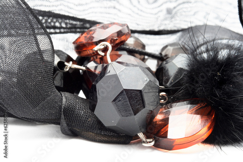 Black ribbon and glassbeads photo