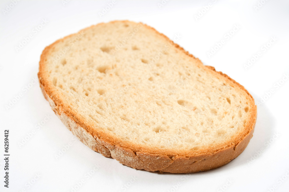 Slice of fresh bread over white background Slice of fresh bread over white background