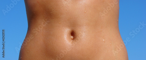 female torso c drops of water photo