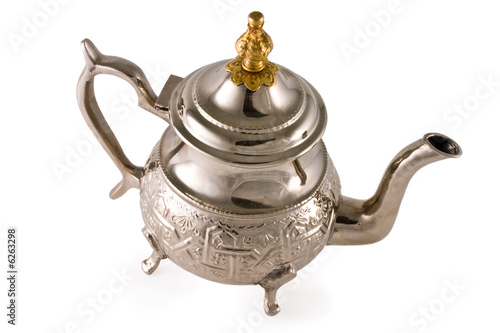 Ancient silver teapot on a white background